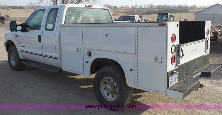 image for item J4709 1999 Ford F350 XLT SuperCab utility truck