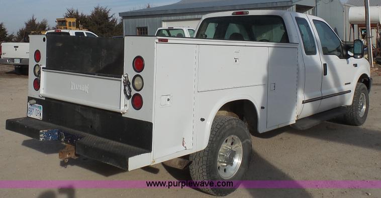 image for item J4709 1999 Ford F350 XLT SuperCab utility truck