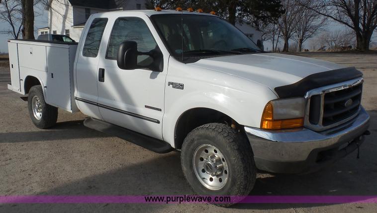 image for item J4709 1999 Ford F350 XLT SuperCab utility truck