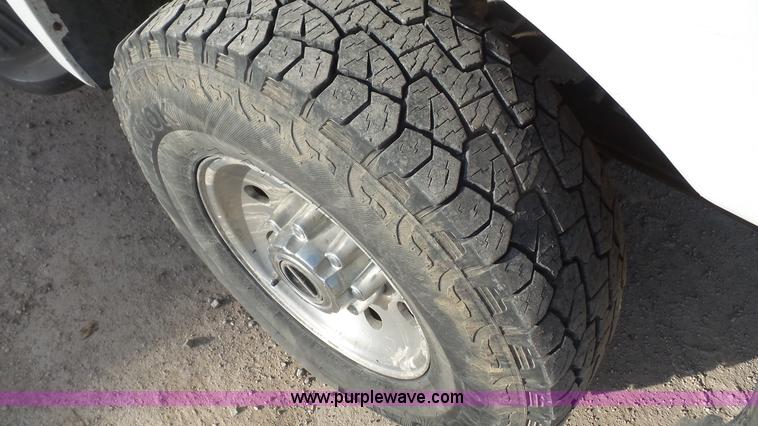 image for item J4709 1999 Ford F350 XLT SuperCab utility truck