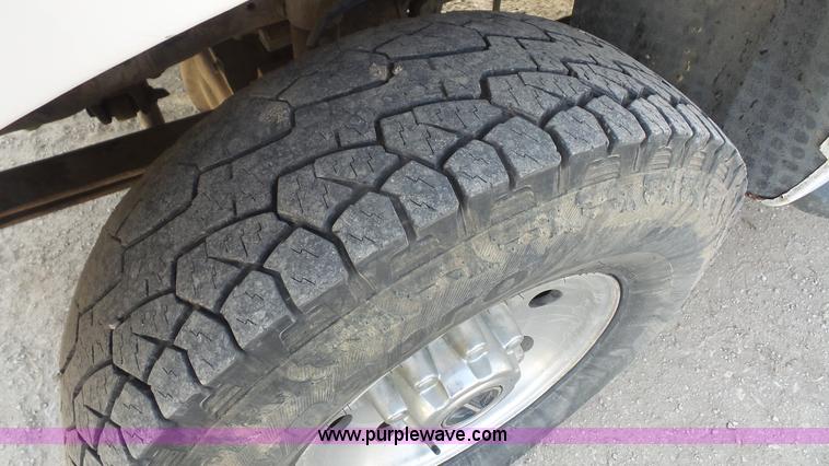 image for item J4709 1999 Ford F350 XLT SuperCab utility truck