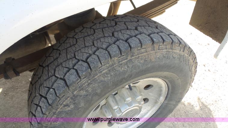 image for item J4709 1999 Ford F350 XLT SuperCab utility truck