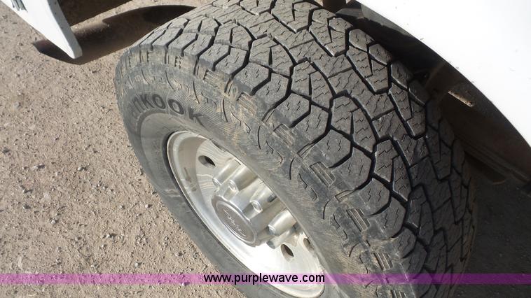 image for item J4709 1999 Ford F350 XLT SuperCab utility truck