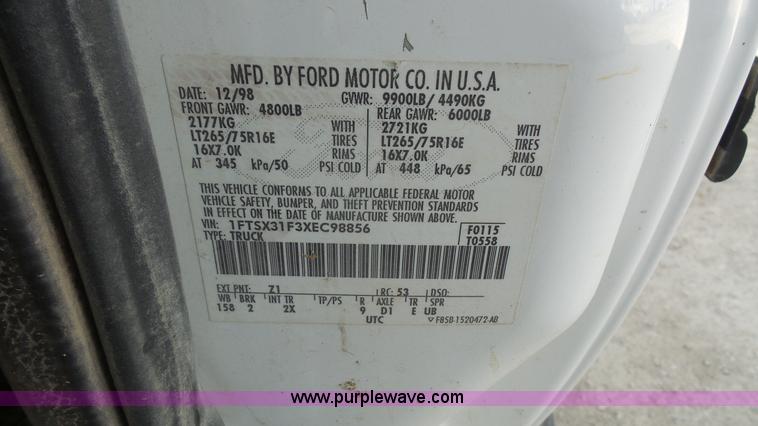 image for item J4709 1999 Ford F350 XLT SuperCab utility truck