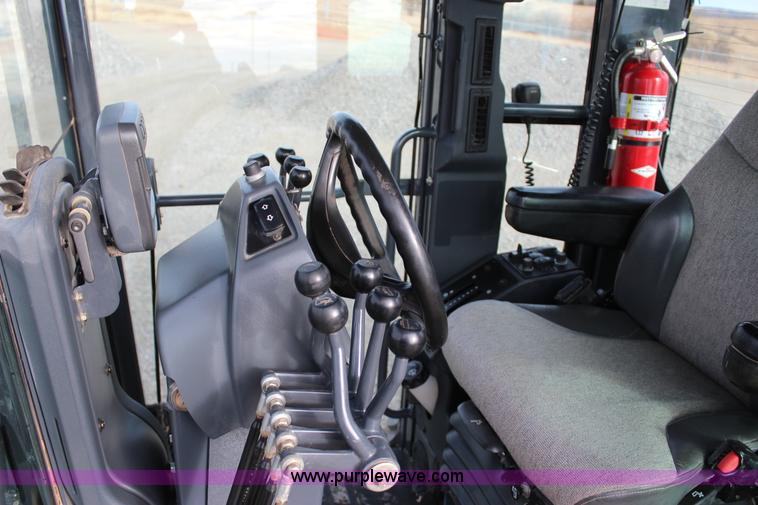 image for item J7575 2011 John Deere 672G motor grader