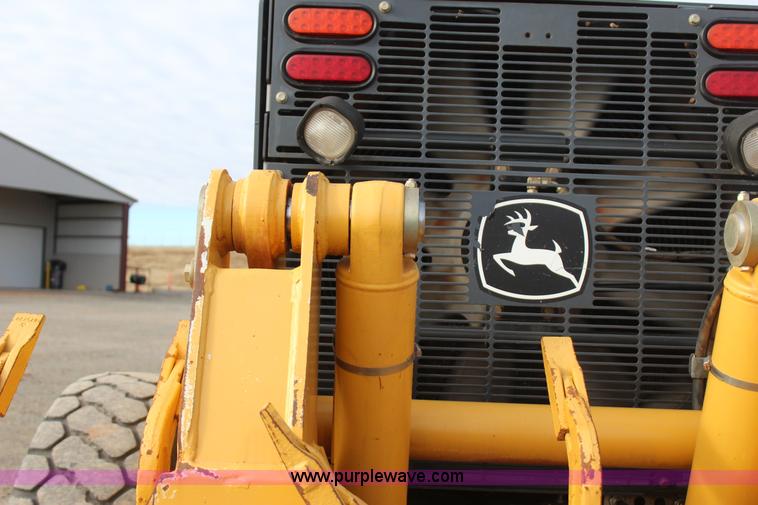 image for item J7575 2011 John Deere 672G motor grader