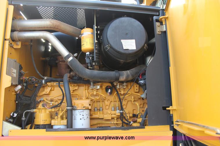 image for item J7575 2011 John Deere 672G motor grader