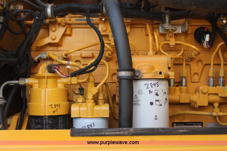 image for item J7575 2011 John Deere 672G motor grader