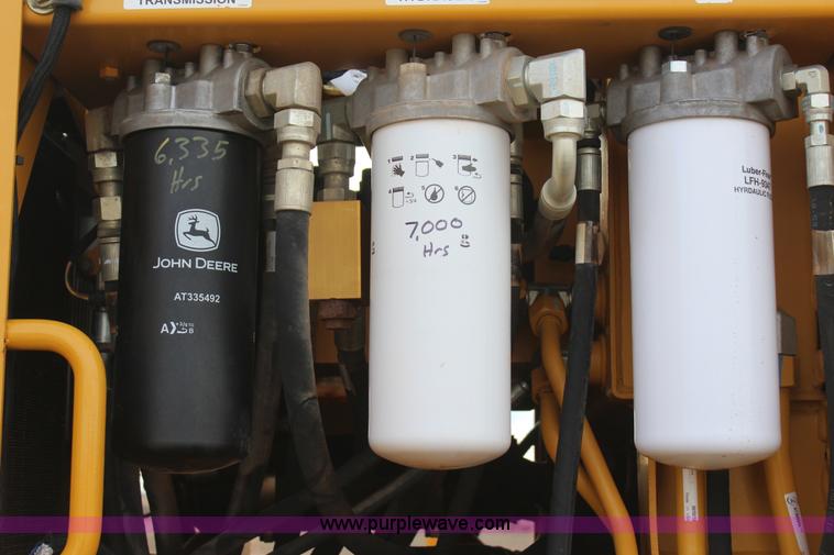 image for item J7575 2011 John Deere 672G motor grader