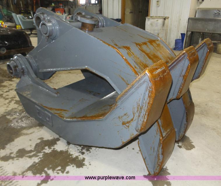 image for item J8819 NPK GR2530 excavator grapple attachment