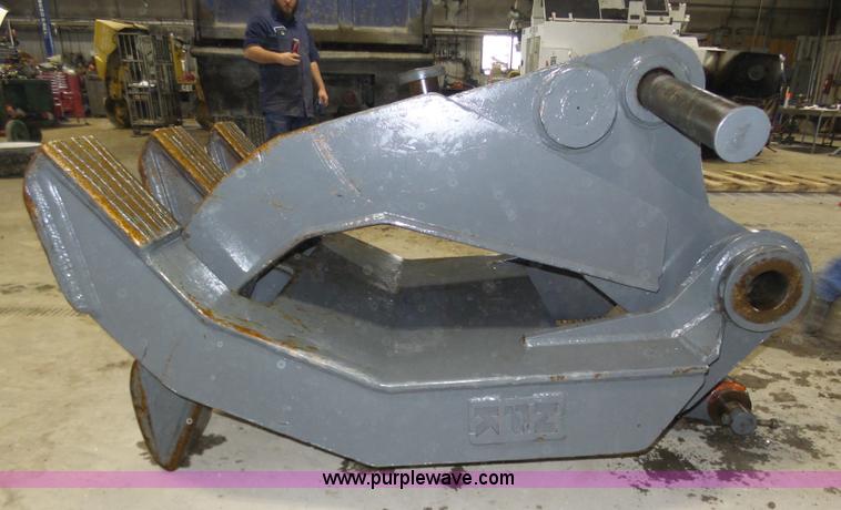 image for item J8819 NPK GR2530 excavator grapple attachment
