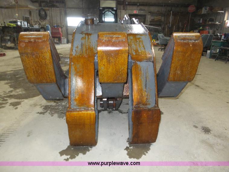 image for item J8819 NPK GR2530 excavator grapple attachment