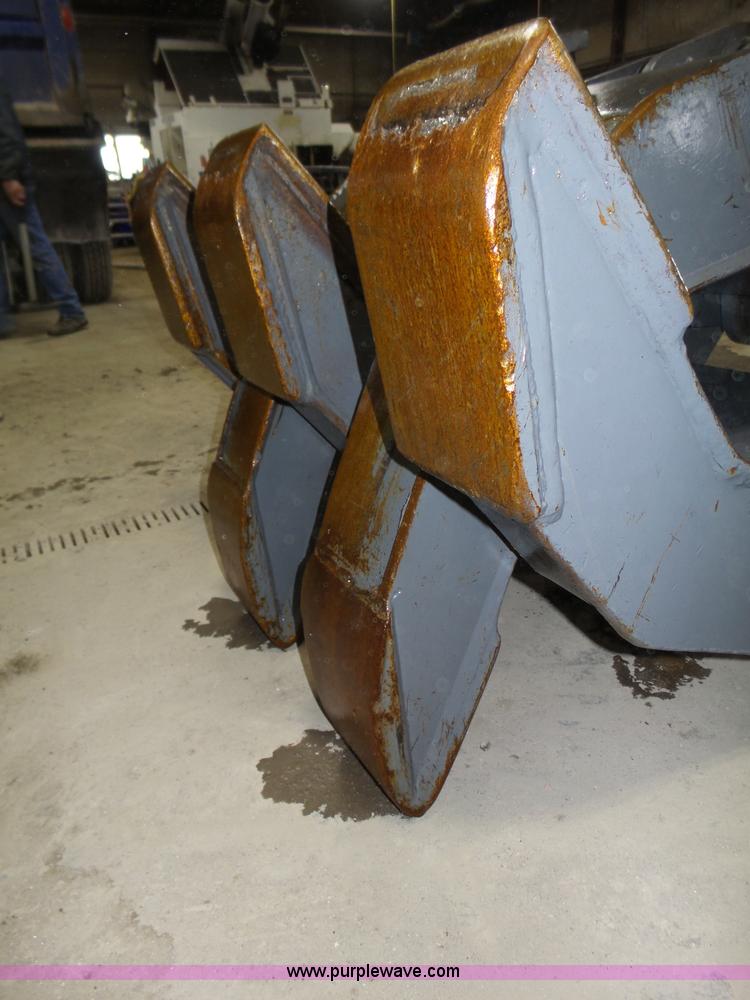 image for item J8819 NPK GR2530 excavator grapple attachment