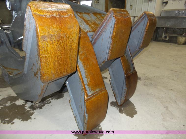 image for item J8819 NPK GR2530 excavator grapple attachment
