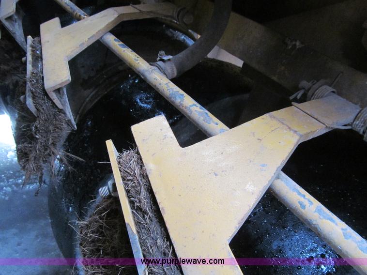 image for item L5566 2003 Caterpillar PS-150B pneumatic roller