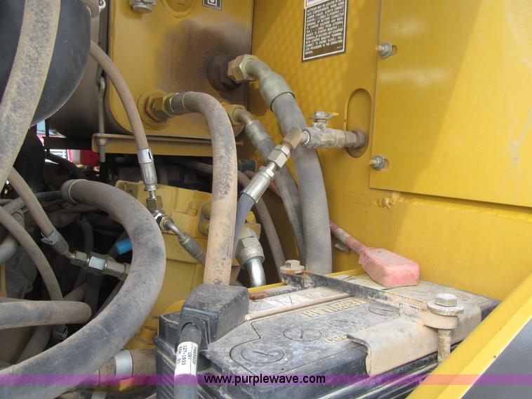 image for item L5566 2003 Caterpillar PS-150B pneumatic roller