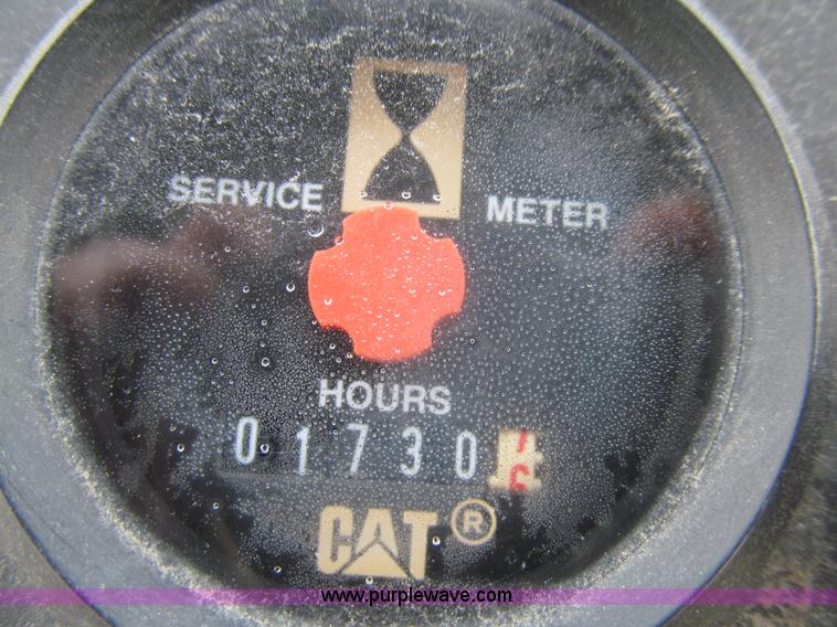 image for item L5566 2003 Caterpillar PS-150B pneumatic roller