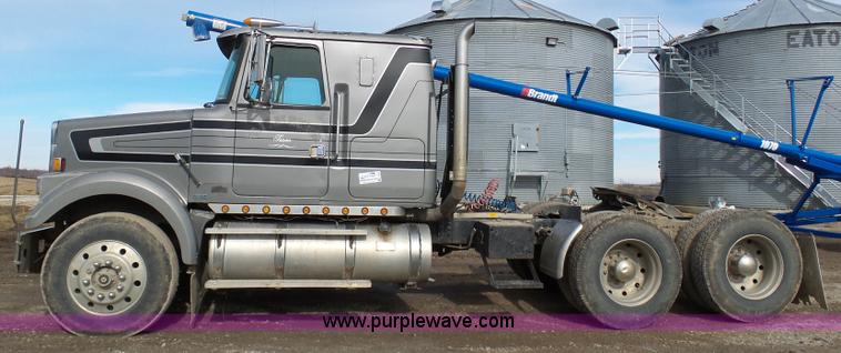 image for item L7062 1987 White WIM semi truck