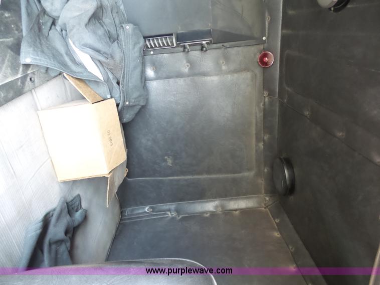 image for item L7062 1987 White WIM semi truck