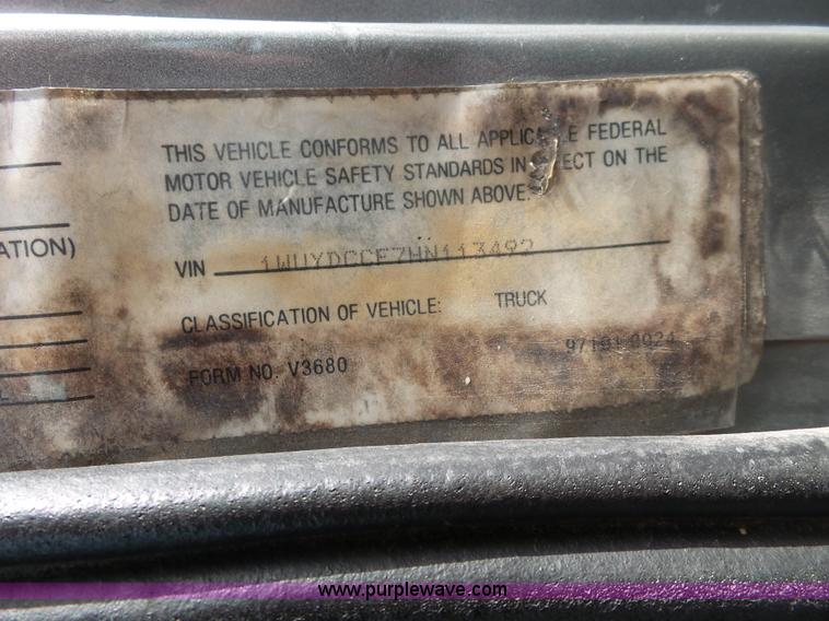 image for item L7062 1987 White WIM semi truck