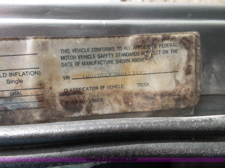 image for item L7062 1987 White WIM semi truck