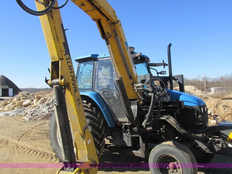 image for item L7087 1999 Ford New Holland TS110 tractor with side boom mower