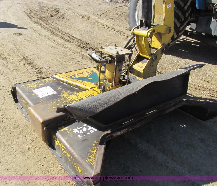 image for item L7087 1999 Ford New Holland TS110 tractor with side boom mower