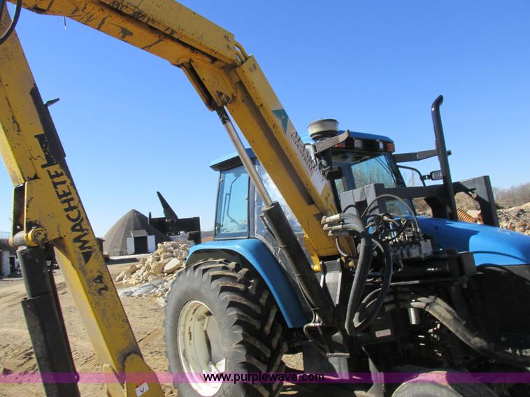 image for item L7087 1999 Ford New Holland TS110 tractor with side boom mower