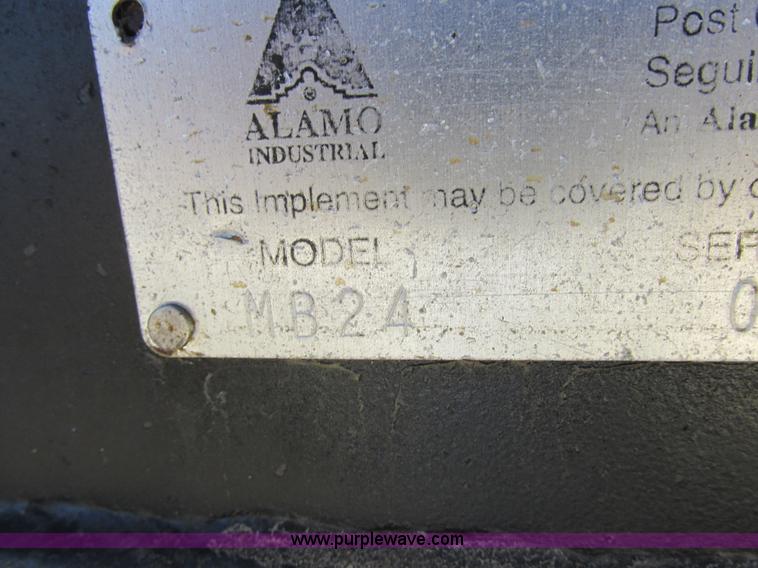 image for item L7087 1999 Ford New Holland TS110 tractor with side boom mower