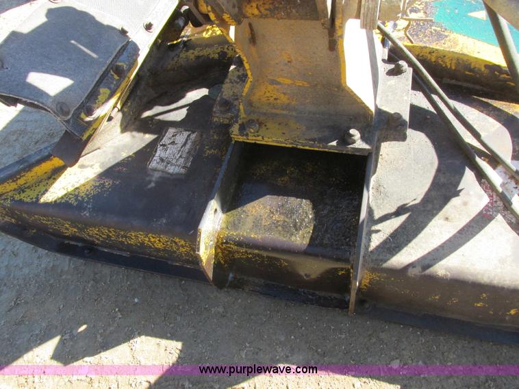 image for item L7087 1999 Ford New Holland TS110 tractor with side boom mower