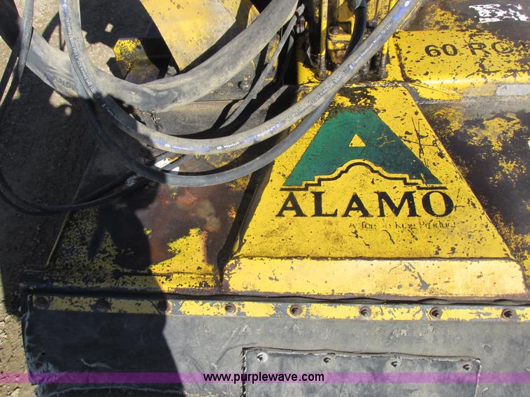 image for item L7087 1999 Ford New Holland TS110 tractor with side boom mower