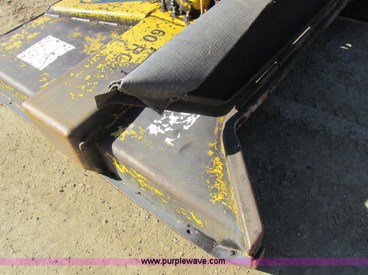 image for item L7087 1999 Ford New Holland TS110 tractor with side boom mower