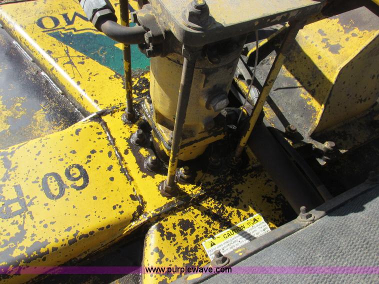 image for item L7087 1999 Ford New Holland TS110 tractor with side boom mower