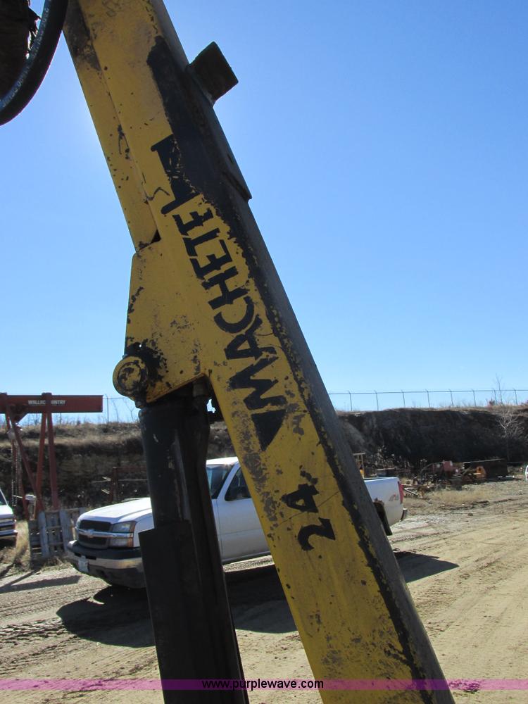 image for item L7087 1999 Ford New Holland TS110 tractor with side boom mower