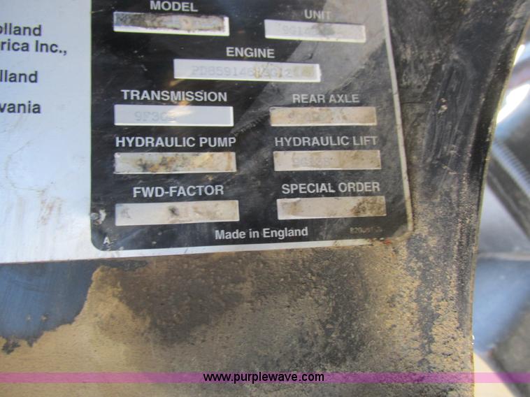 image for item L7087 1999 Ford New Holland TS110 tractor with side boom mower