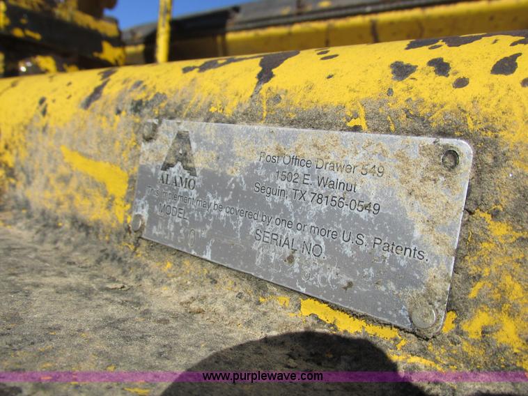 image for item L7087 1999 Ford New Holland TS110 tractor with side boom mower