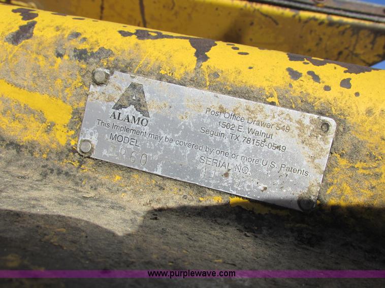 image for item L7087 1999 Ford New Holland TS110 tractor with side boom mower