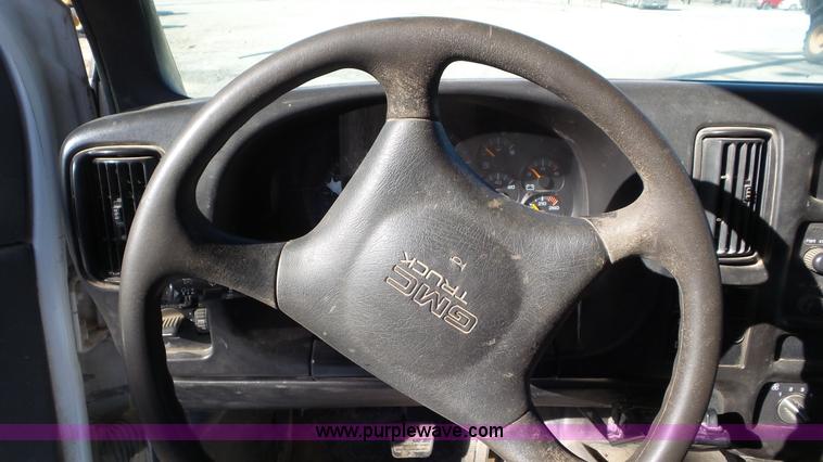 image for item N9441 2006 GMC C7500 flatbed truck with crane