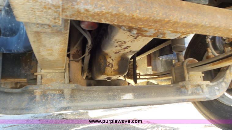 image for item N9441 2006 GMC C7500 flatbed truck with crane