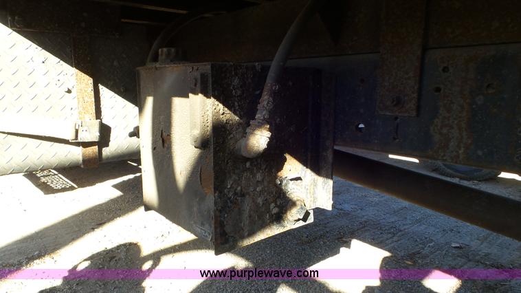 image for item N9441 2006 GMC C7500 flatbed truck with crane