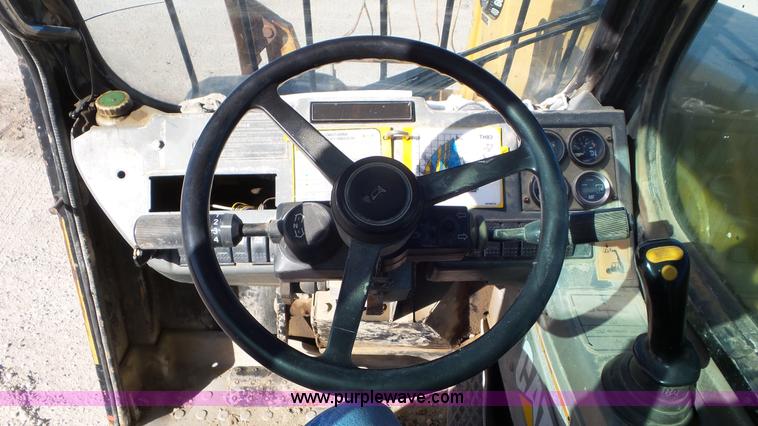 image for item N9442 1997 Caterpillar TH83 telehandler