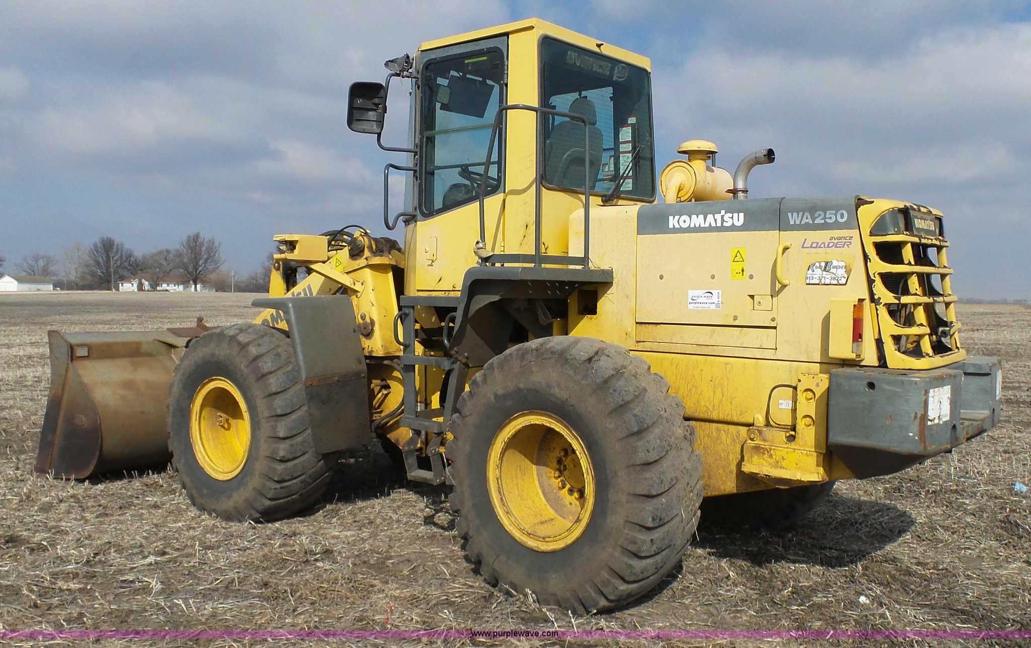 2000 Komatsu WA2503MC wheel loader in Belton, MO Item K4258 sold