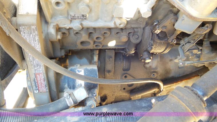 image for item J6801 1994 Ford F700 dump truck