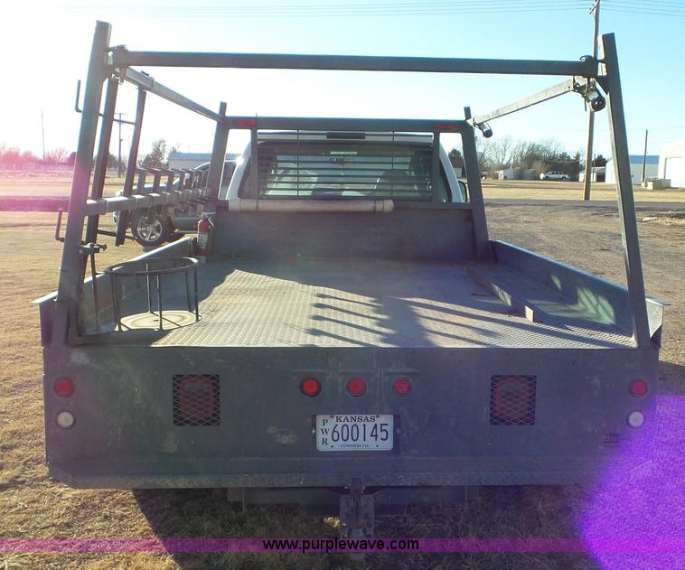 image for item J8294 2006 Ford F450 Super Duty SuperCrew flatbed truck