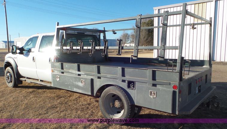 image for item J8294 2006 Ford F450 Super Duty SuperCrew flatbed truck