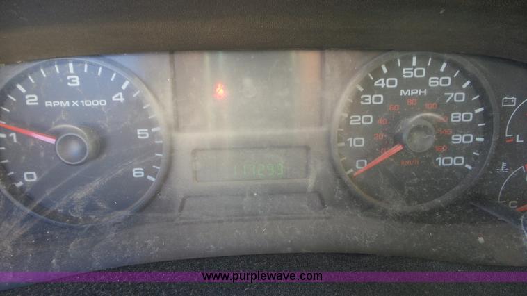 image for item J8294 2006 Ford F450 Super Duty SuperCrew flatbed truck