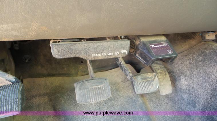 image for item J8294 2006 Ford F450 Super Duty SuperCrew flatbed truck