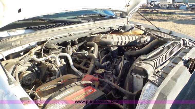 image for item J8294 2006 Ford F450 Super Duty SuperCrew flatbed truck