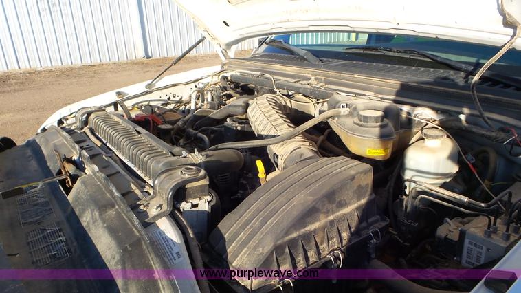 image for item J8294 2006 Ford F450 Super Duty SuperCrew flatbed truck