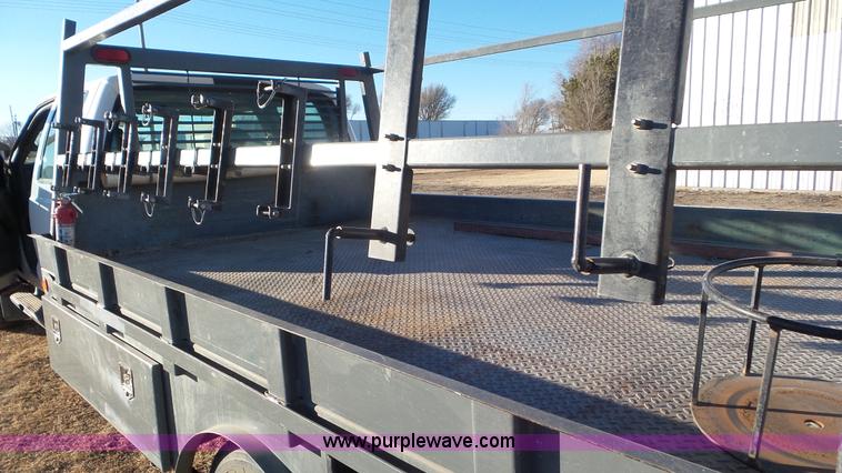 image for item J8294 2006 Ford F450 Super Duty SuperCrew flatbed truck